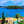 uitzicht over blauwe zee vanaf kustlijn met huisjes en bomen op het griekse eiland lefkas